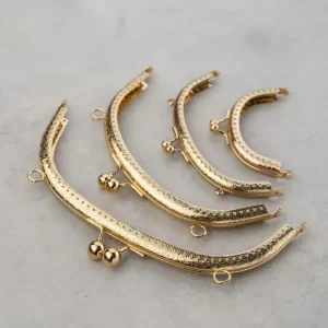دهانه فلزی کیف نیم هلال طلایی